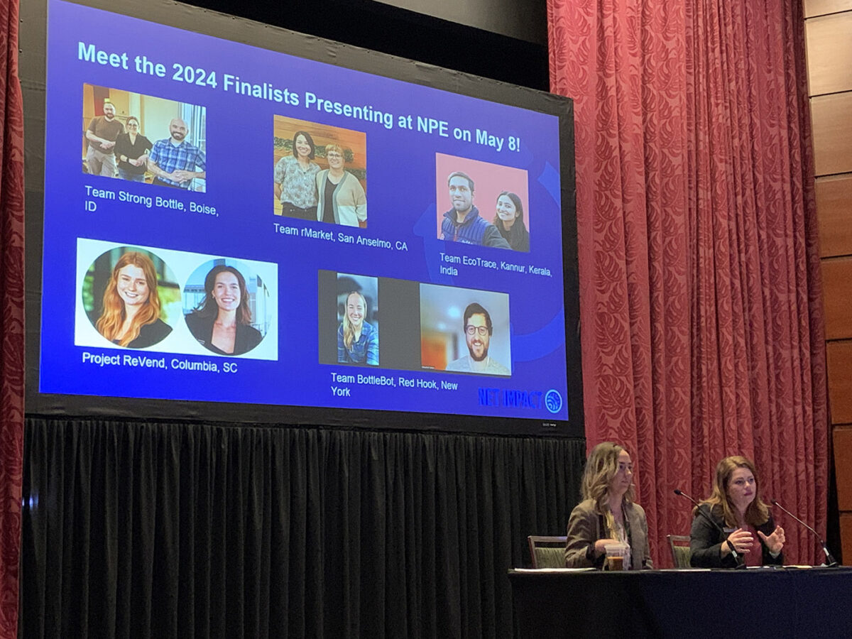 Net Impact’s Hilary Manzo (left) and Hillenbrand’s Tory Flynn hosted a media briefing on May 7 at NPE. The slide projected behind them shows the five finalists team in 2024 Circular Plastics Challenge.