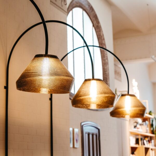 3D-printed lamps made from SCG LOWIMPACT polymer at D-Origen Coffee Shop. Courtesy of LOWPOLY.