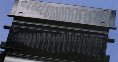 Jetting is a defect arising from a steep change in cross-section area between the gate and the mold to be filled. Courtesy of Kunststoff Institut Lüdenscheid.